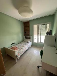 Postel nebo postele na pokoji v ubytování Villa for rent in Rabat, near the beach + 3 fotografie