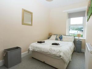 Postel nebo postele na pokoji v ubytování 2 Argoed