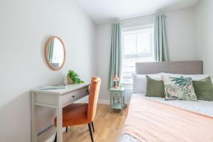 Ένα ή περισσότερα κρεβάτια σε δωμάτιο στο Cosy apartment in the heart of ballyclare