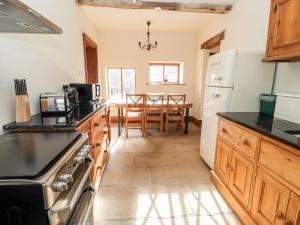 Η κουζίνα ή μικρή κουζίνα στο Woodsorrel Cottage