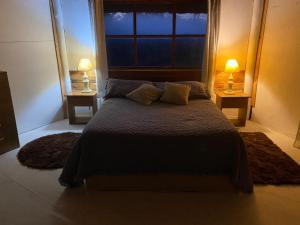 Postel nebo postele na pokoji v ubytování Morocha + 4 fotografie