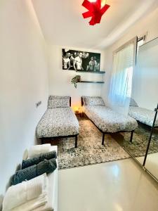 Posezení v ubytování RIMINI Urban Suite Apartament + 8 fotografií
