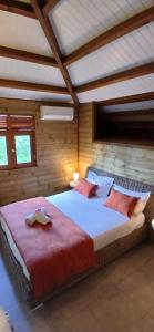 Ένα ή περισσότερα κρεβάτια σε δωμάτιο στο Villa Ti Colibri