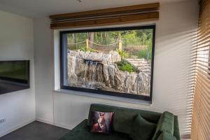 Et tv og/eller underholdning på Szumy Villas - Roztocze Huta Szumy