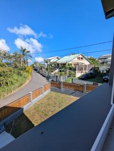 a view from the balcony of a house at Le jamerosas in Le Tampon