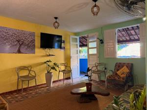 TV a/nebo společenská místnost v ubytování Casa Bantu - Vila Rosa