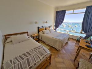 Ένα ή περισσότερα κρεβάτια σε δωμάτιο στο Hotel Panoramico