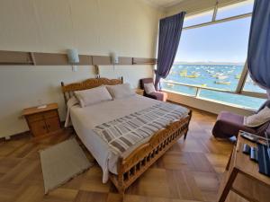 Ένα ή περισσότερα κρεβάτια σε δωμάτιο στο Hotel Panoramico