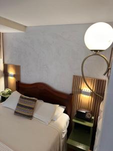 Ένα ή περισσότερα κρεβάτια σε δωμάτιο στο Skema Collections Quito