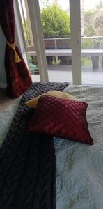 Postel nebo postele na pokoji v ubytování Matai Whetū - Stargazer Tutukaka