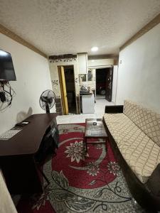 Posezení v ubytování 6th of October Studios الحي الاول + 19 fotografií