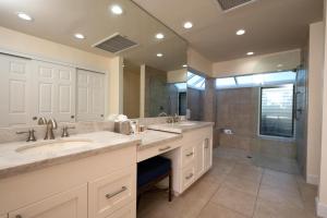 a large bathroom with two sinks and a shower at Kapalua Bay Villas 2 Free Rental Cars KBM Resorts Large Master Suite 2 Units 3 Bedrooms ML-1528 in Honokahua +29 photos