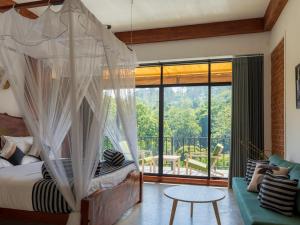 Ένα ή περισσότερα κρεβάτια σε δωμάτιο στο Ella Trail Luxury Villa