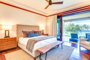 a bedroom with a large bed and a balcony at Montage Kapalua Bay 2 Free Rental Cars KBM Resorts Beautiful Villa At Montage Kapalua Bay 2 Units 6 Bedrooms ML-1507 in Honokahua +49 photos