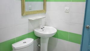 Koupelna v ubytování Buceo Inn Mathiveri