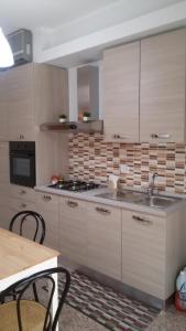 Kuchyň nebo kuchyňský kout v ubytování Casa Trinacria