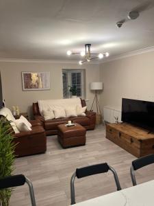 Et tv og/eller underholdning på Modern 2 Bed near Heathrow - Work or Travel Ready