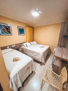 Postel nebo postele na pokoji v ubytování Pousada do Imperador