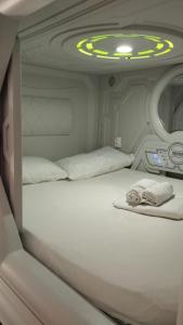 Ένα ή περισσότερα κρεβάτια σε δωμάτιο στο min hostel reverencia