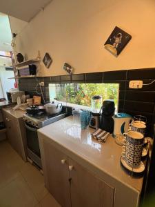 Kuchyň nebo kuchyňský kout v ubytování Casa Greemat 3Habs con AC, piscina y a pasos del mar