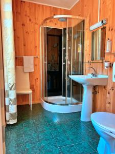 Koupelna v ubytování Les Callunes anciennement Le Beauséjour