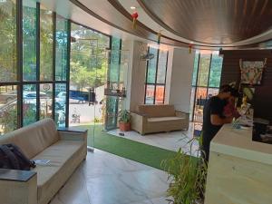 Χώρος καθιστικού στο Hotel O Sai Sparash