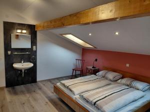 Postel nebo postele na pokoji v ubytování Ferienhaus Gioia