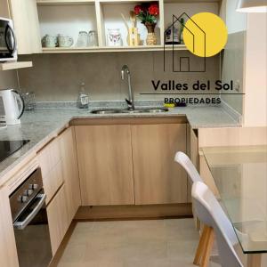 Kuchyň nebo kuchyňský kout v ubytování Arriendo Lindo Departamento a pasos de La Playa La Serena
