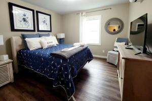 Ένα ή περισσότερα κρεβάτια σε δωμάτιο στο The Front St Lofts, sleeps 8