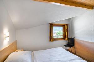 Postel nebo postele na pokoji v ubytování Appartement Nr 22 Haus Voglreiter