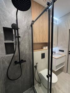 Ένα μπάνιο στο Cozy apartment in Lviv