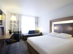 Ένα ή περισσότερα κρεβάτια σε δωμάτιο στο Novotel Paris Gare De Lyon