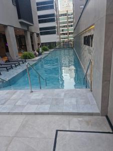 Πισίνα στο ή κοντά στο Apto em Itapema com acesso a piscinas,sendo uma aquecida e academia