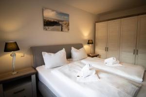 Postel nebo postele na pokoji v ubytování Deichliebe Pilsum