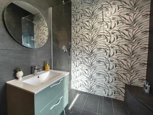 a bathroom with a sink and a mirror at Las Huertas del Abrilongo in La Codosera +32 photos