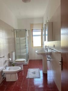 Koupelna v ubytování Heron House Appartaments + 23 fotografií