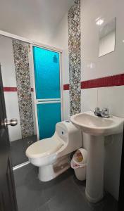 Koupelna v ubytování Apartamentos Full Confort en el corazón de Valledupa