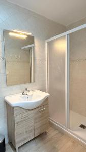 a bathroom with a sink and a shower at Ginevra house in Naples +27 photos