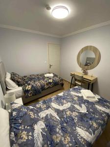 Ένα ή περισσότερα κρεβάτια σε δωμάτιο στο MarSia Apartment