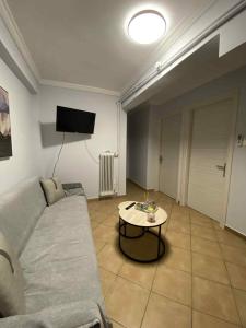 Μια τηλεόραση ή/και κέντρο ψυχαγωγίας στο MarSia Apartment +44 φωτογραφίες