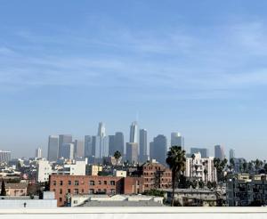 a view of a city skyline with buildings at Glamorous KTown Boutique Residences with Rooftop view in Los Angeles