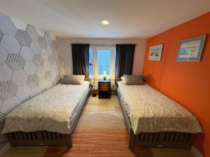 Postel nebo postele na pokoji v ubytování 好丘。Hacho House