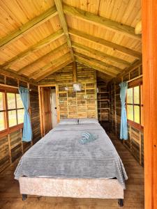 Postel nebo postele na pokoji v ubytování Finca Villa Julia