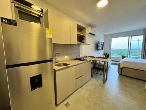 Η κουζίνα ή μικρή κουζίνα στο Apartamento cerca del mar- SantaMarina-604