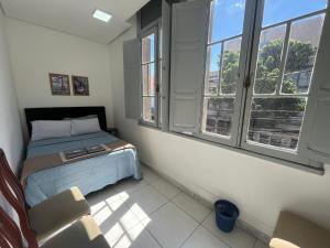 Postel nebo postele na pokoji v ubytování Rota BH Hostel