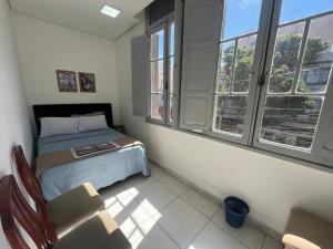 Postel nebo postele na pokoji v ubytování Rota BH Hostel