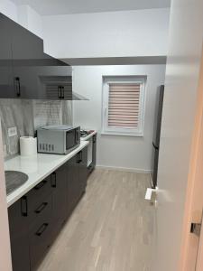 Kuchyň nebo kuchyňský kout v ubytování Antonia