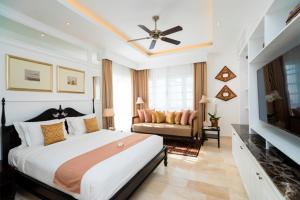 Postel nebo postele na pokoji v ubytování The Colony Hotel Bali + 37 fotografií