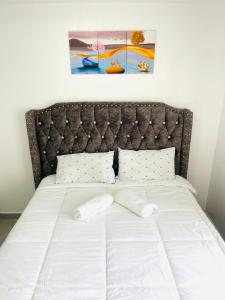 Ένα ή περισσότερα κρεβάτια σε δωμάτιο στο Casa Cosy