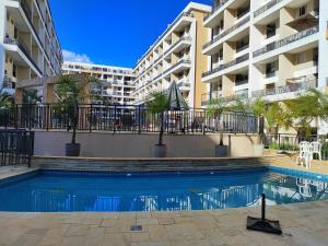 Bazén v ubytování espetacular flat em resort nebo v jeho okolí